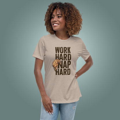 Woman wearing a beige T-shirt with 'Work Hard Nap Hard' text and a sleepy bear graphic on a teal background