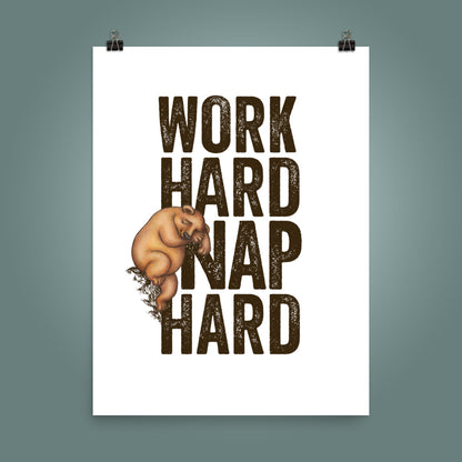 18 inch by 24 inch poster with bold, upper case 'Work Hard Nap Hard' text and a cute  illustration of a sleepy bear on a plain white surface, with a teal wall behind the poster